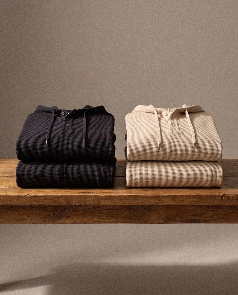 Folded hoodies still life