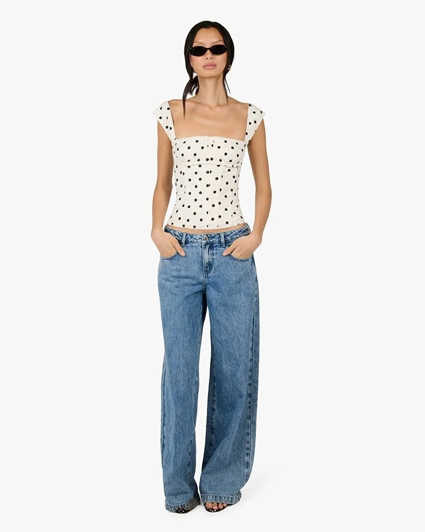 Polka-dot corset top on model