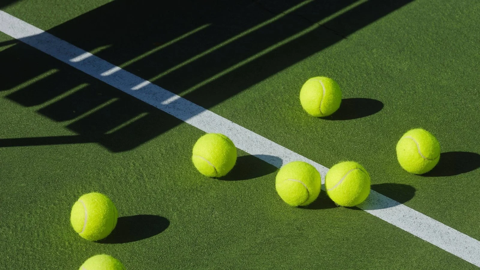 Tennis balls on the court