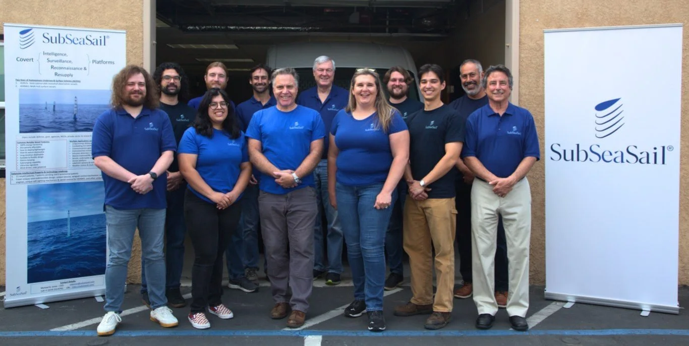 The SubSeaSail team outside the San Diego workshop