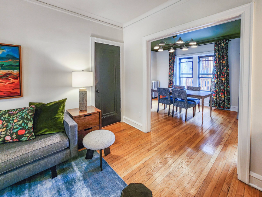 A Bedder Place: View from the living room through the wide doorway into the dining room.