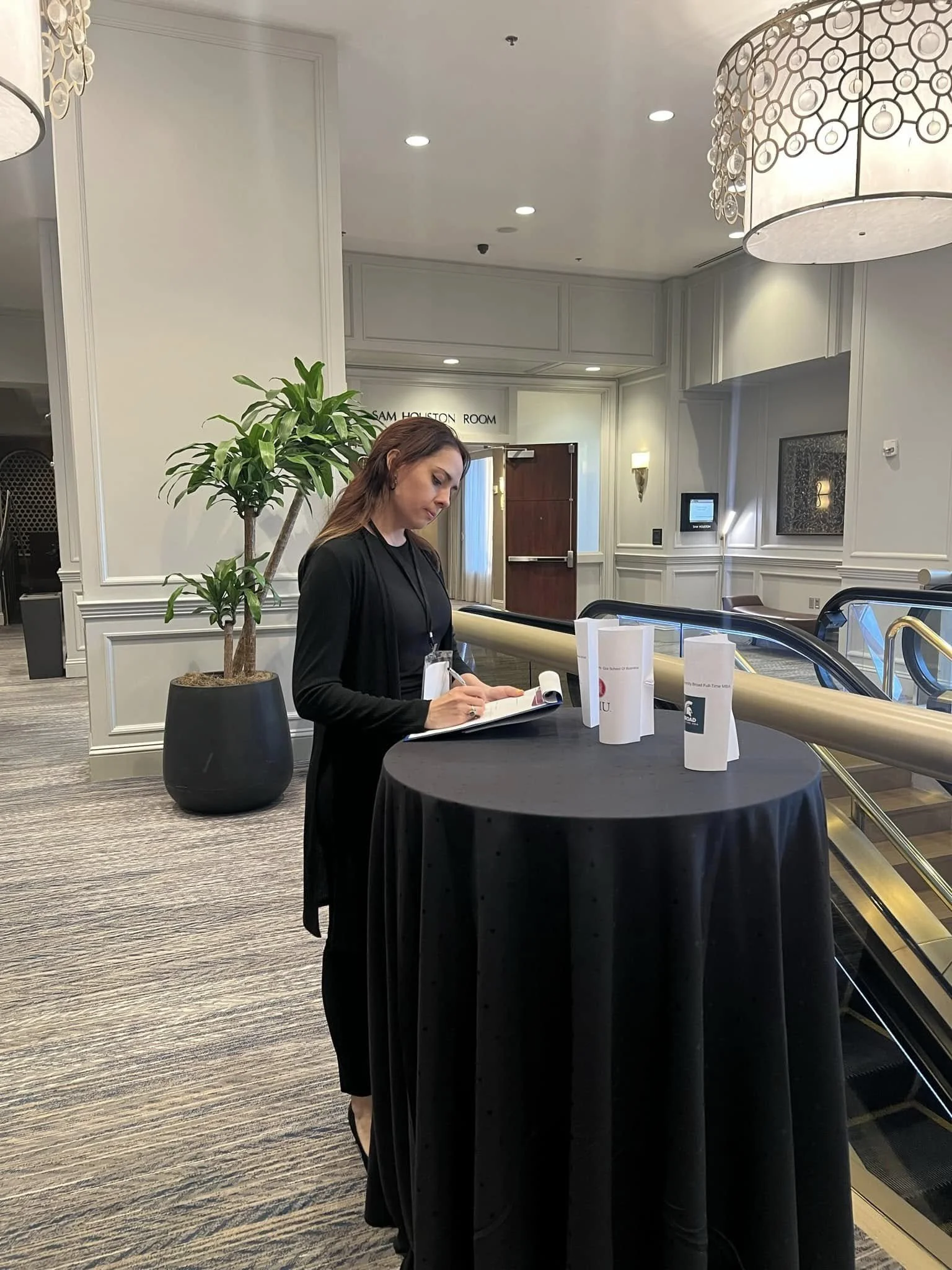 Registration team assisting guests during an event