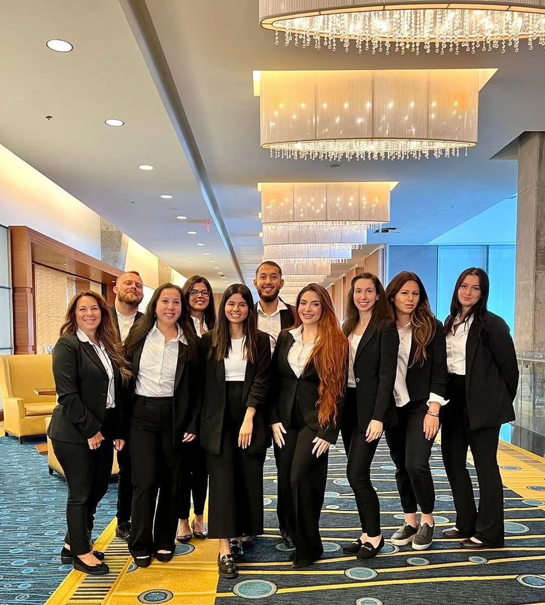 Blossom Talent corporate event staffing coordinators setting up registration operations