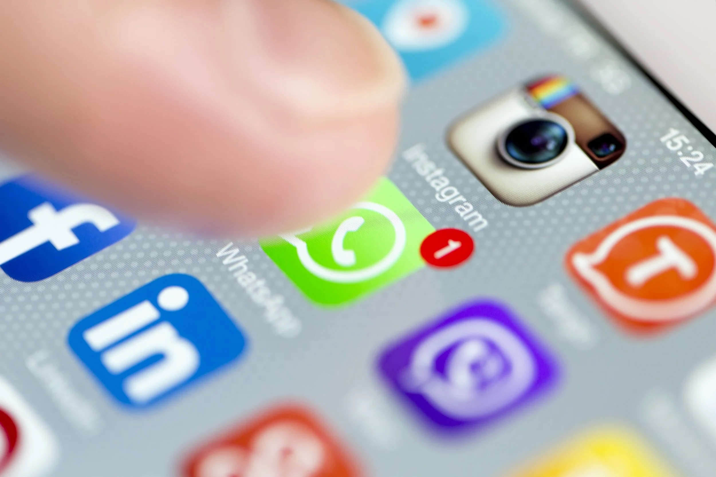 WhatsApp invite pack shown on mobile with stickers and countdown
