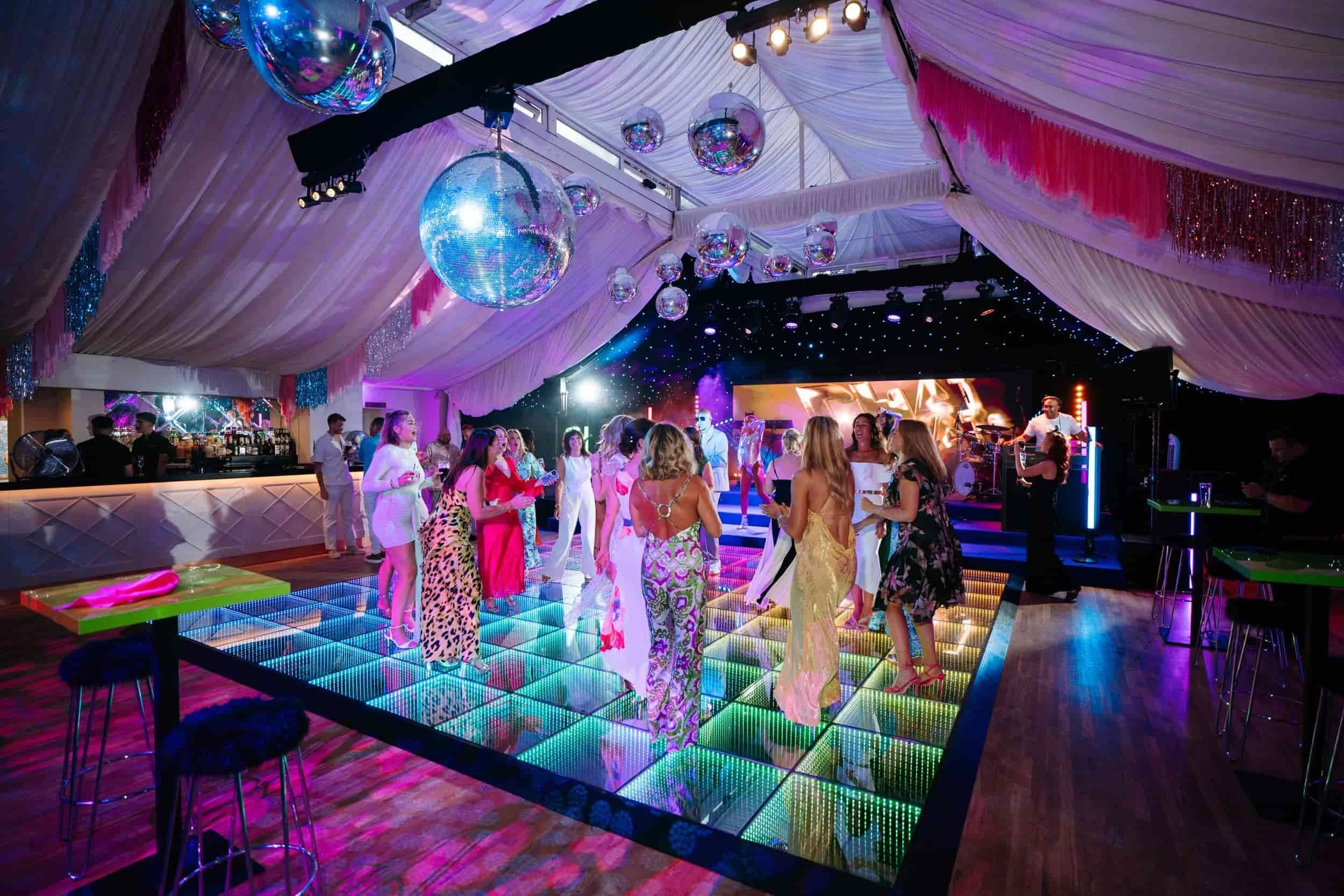 Infinity LED dancefloor glowing at event
