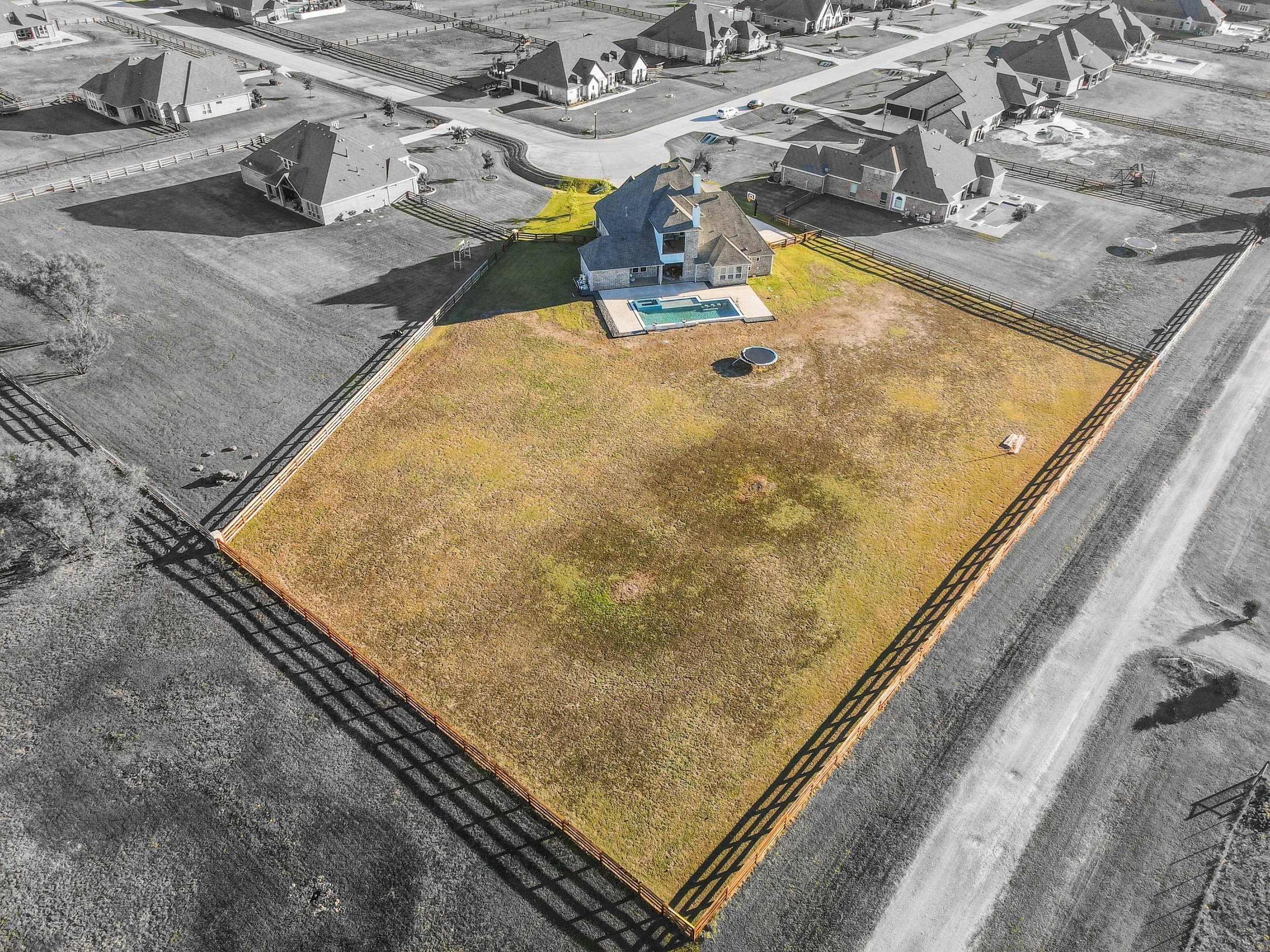 Color-Pop aerial photo highlighting property boundaries