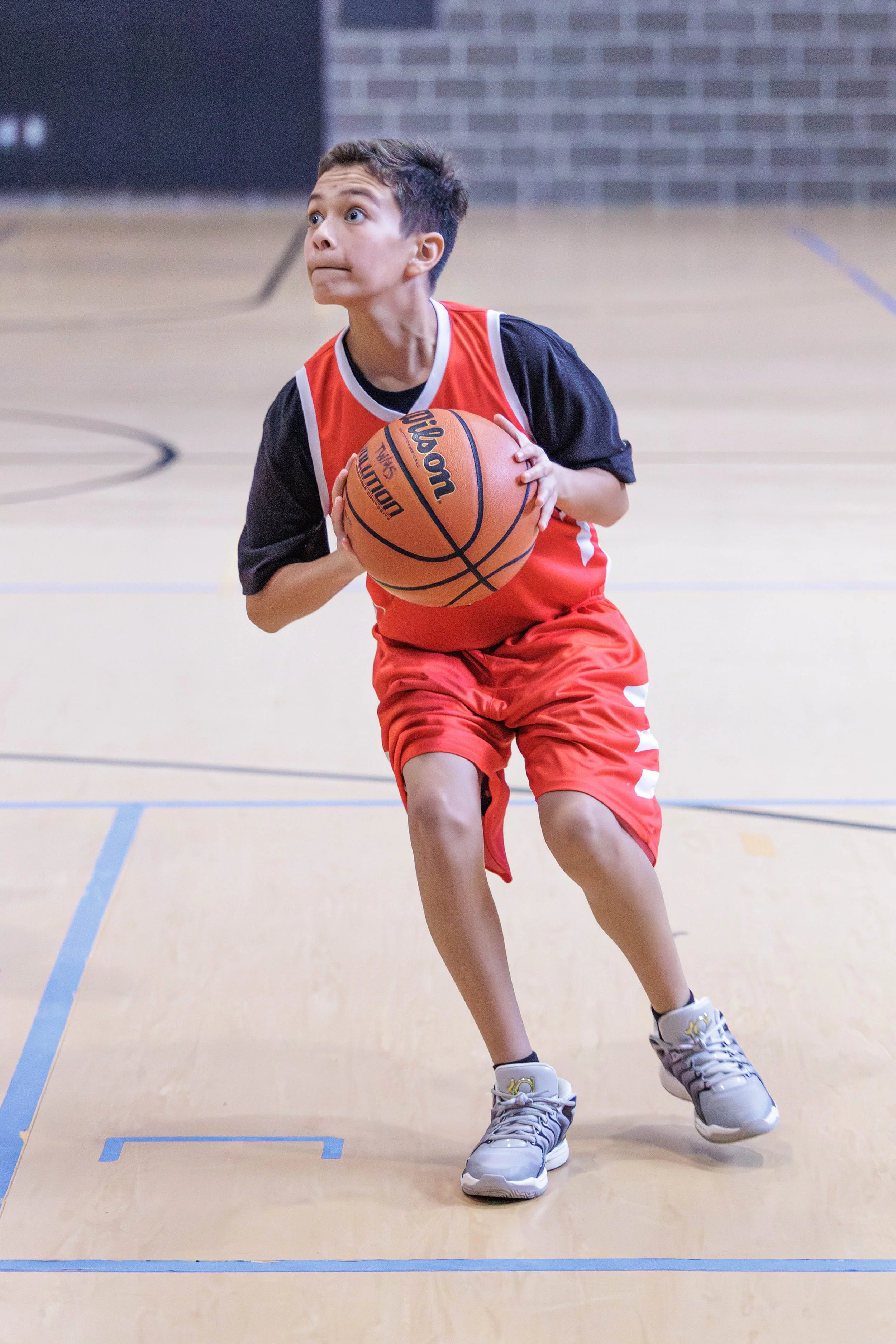 Coach Deon Boys Inspire player during league competition.