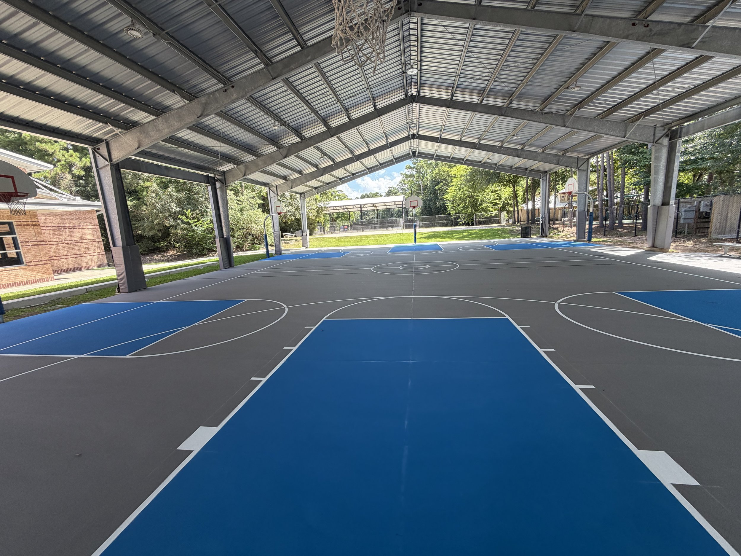 Youth basketball players developing with Coach Deon Basketball in The Woodlands, Texas