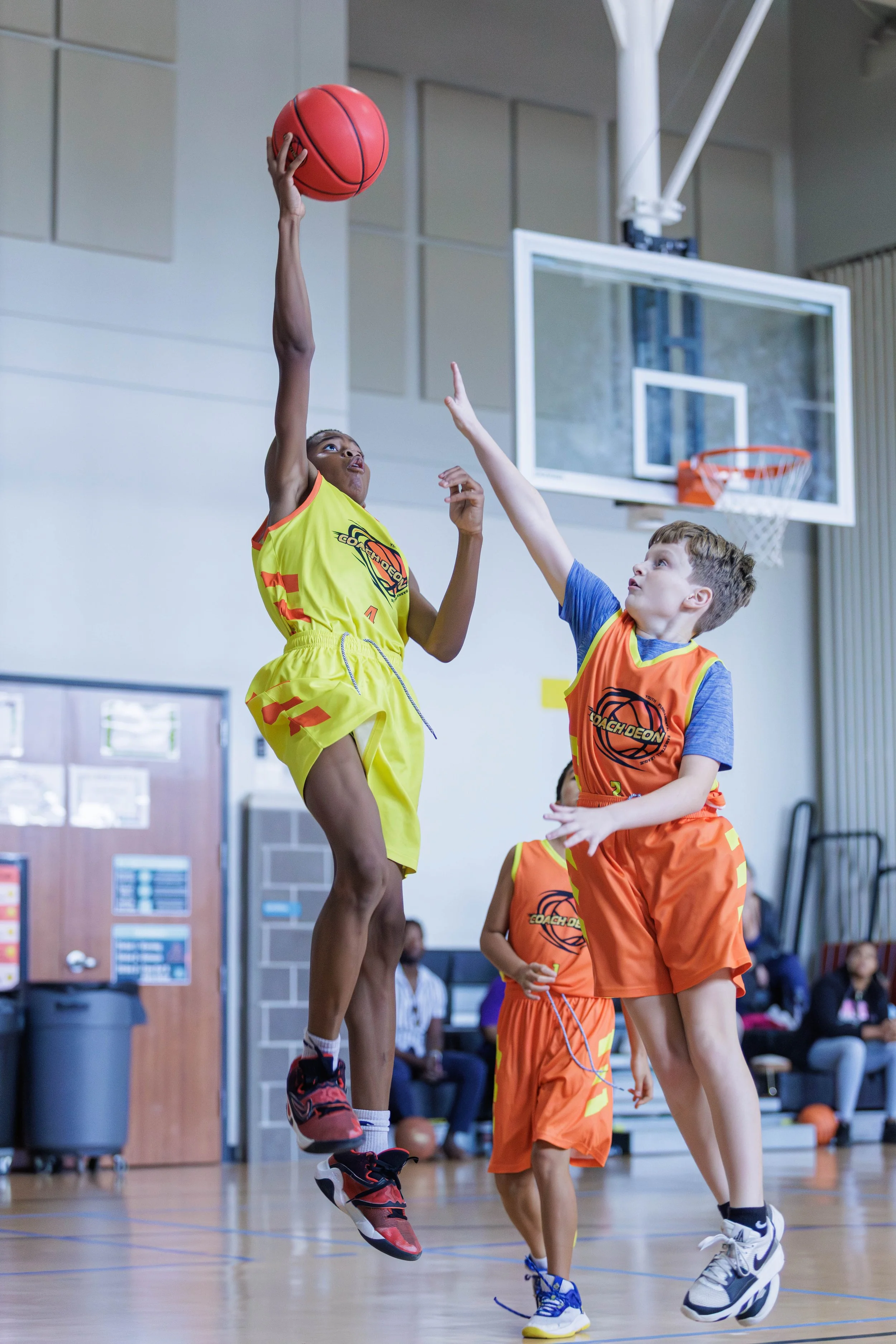 Boys competing during a Coach Deon Basketball league game in The Woodlands, Texas.