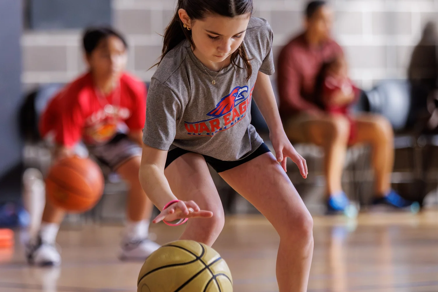 Coach Deon leading a youth basketball skills class in The Woodlands, Texas