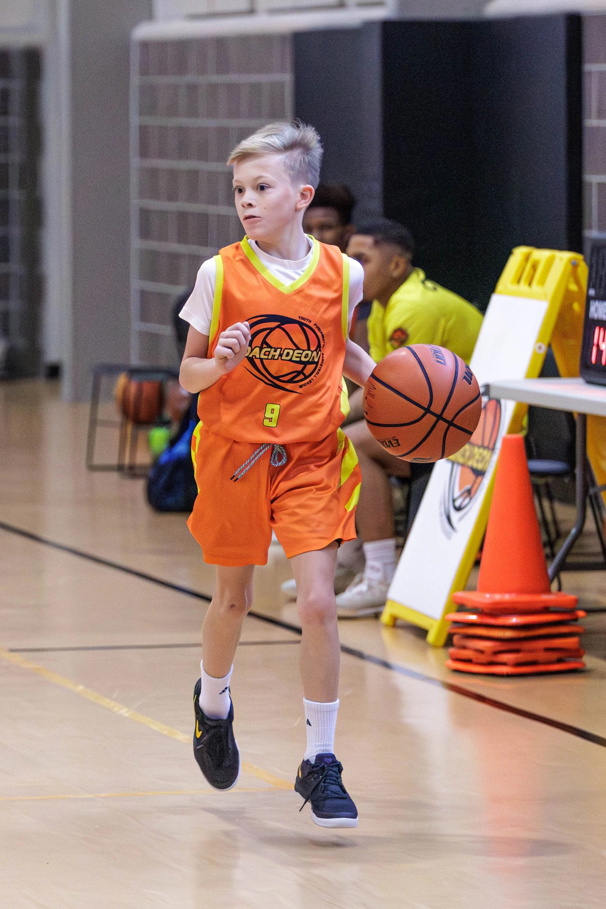 Boys Inspire players developing through live basketball competition.