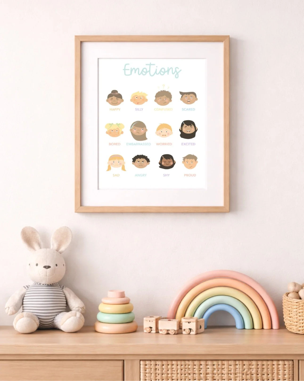 Framed emotions poster on the calming corner wall — feelings vocabulary at kid height