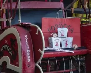 Formosa Hollywood rickshaw with branded takeout boxes