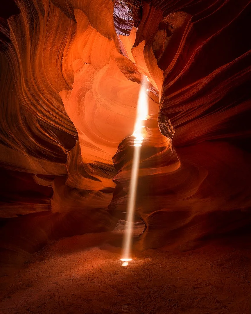 Antelope Canyon detail with warm light and sandstone curves photographed by Dylan Knight