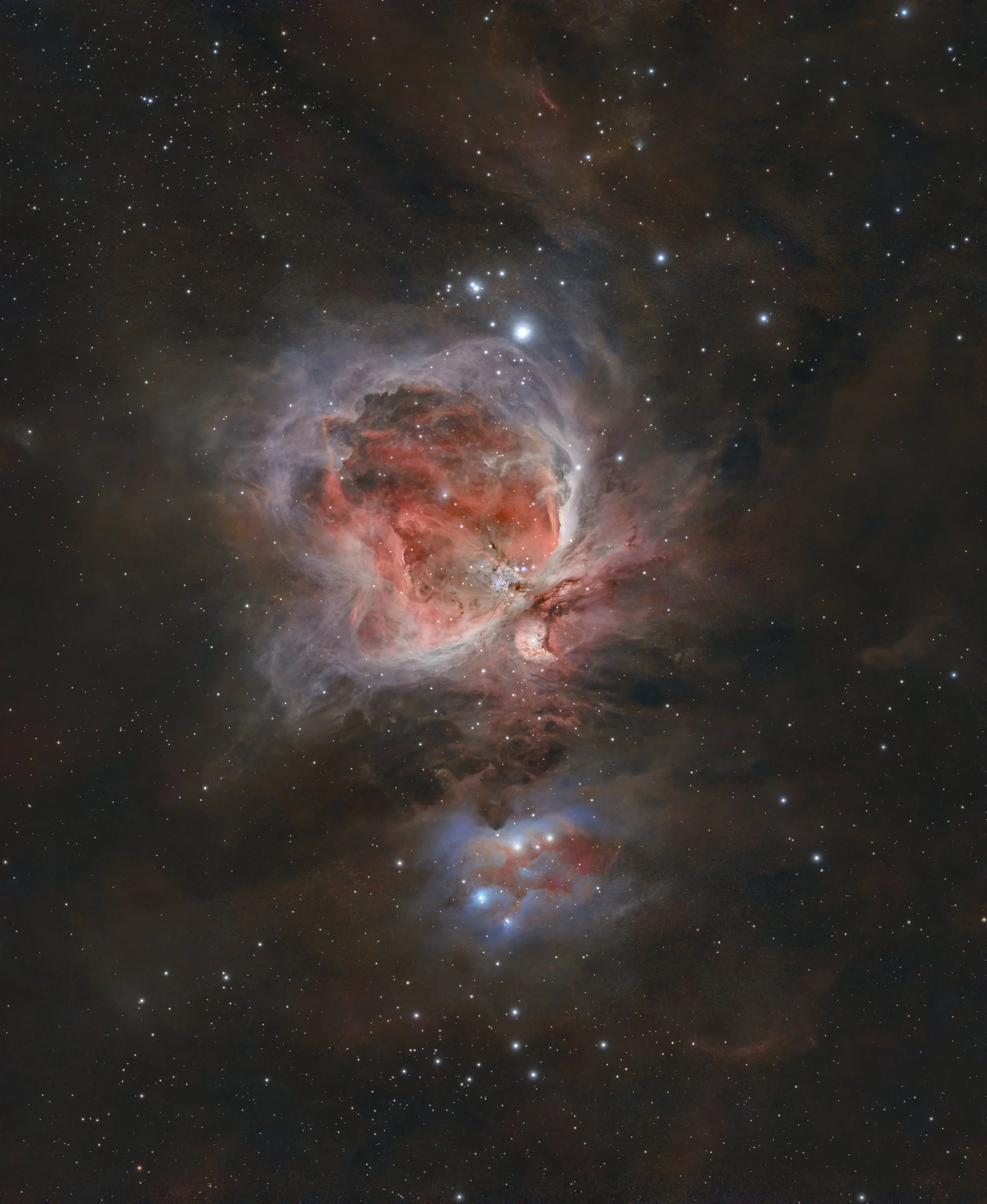 Orion Nebula M42 captured with the DWARF Mini in a 24-hour three-panel HDR mosaic showing the Trapezium, Running Man Nebula and surrounding dust.