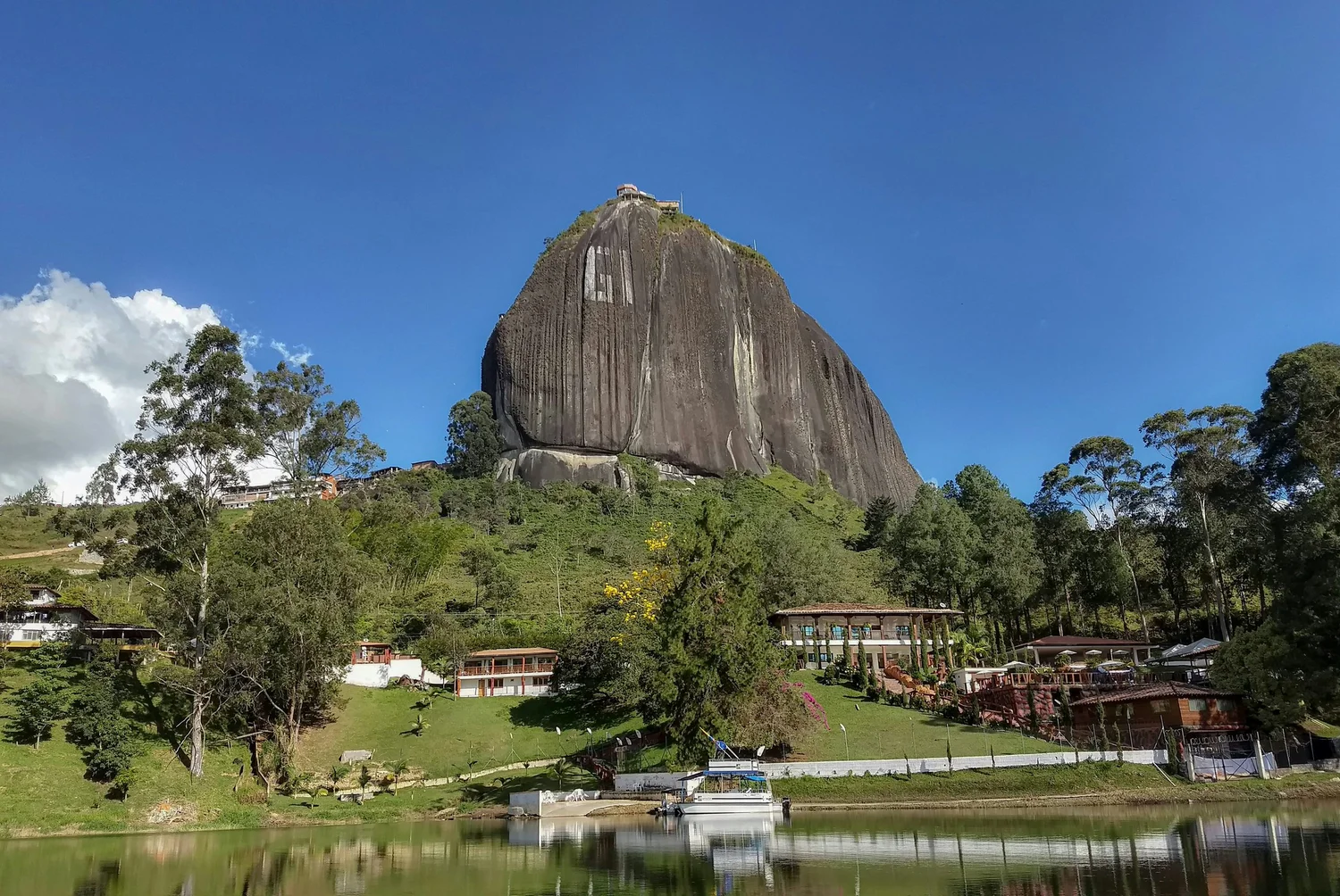 Piedra del Peñol rising over the Guatapé reservoir