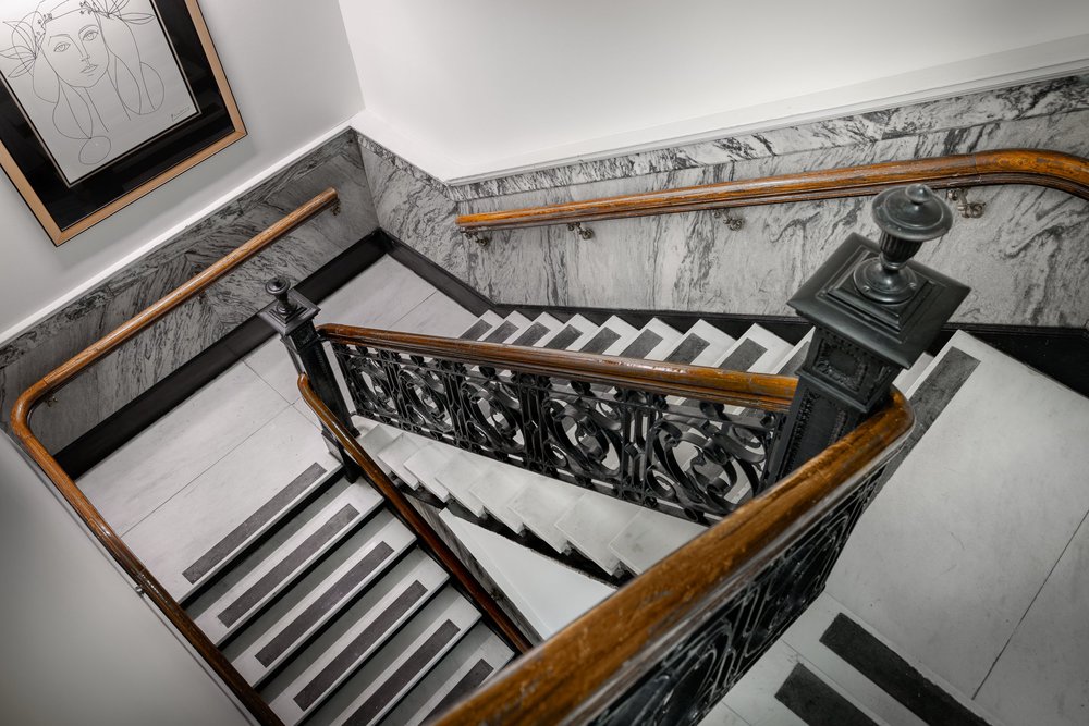 Restored staircase inside 917 Franklin
