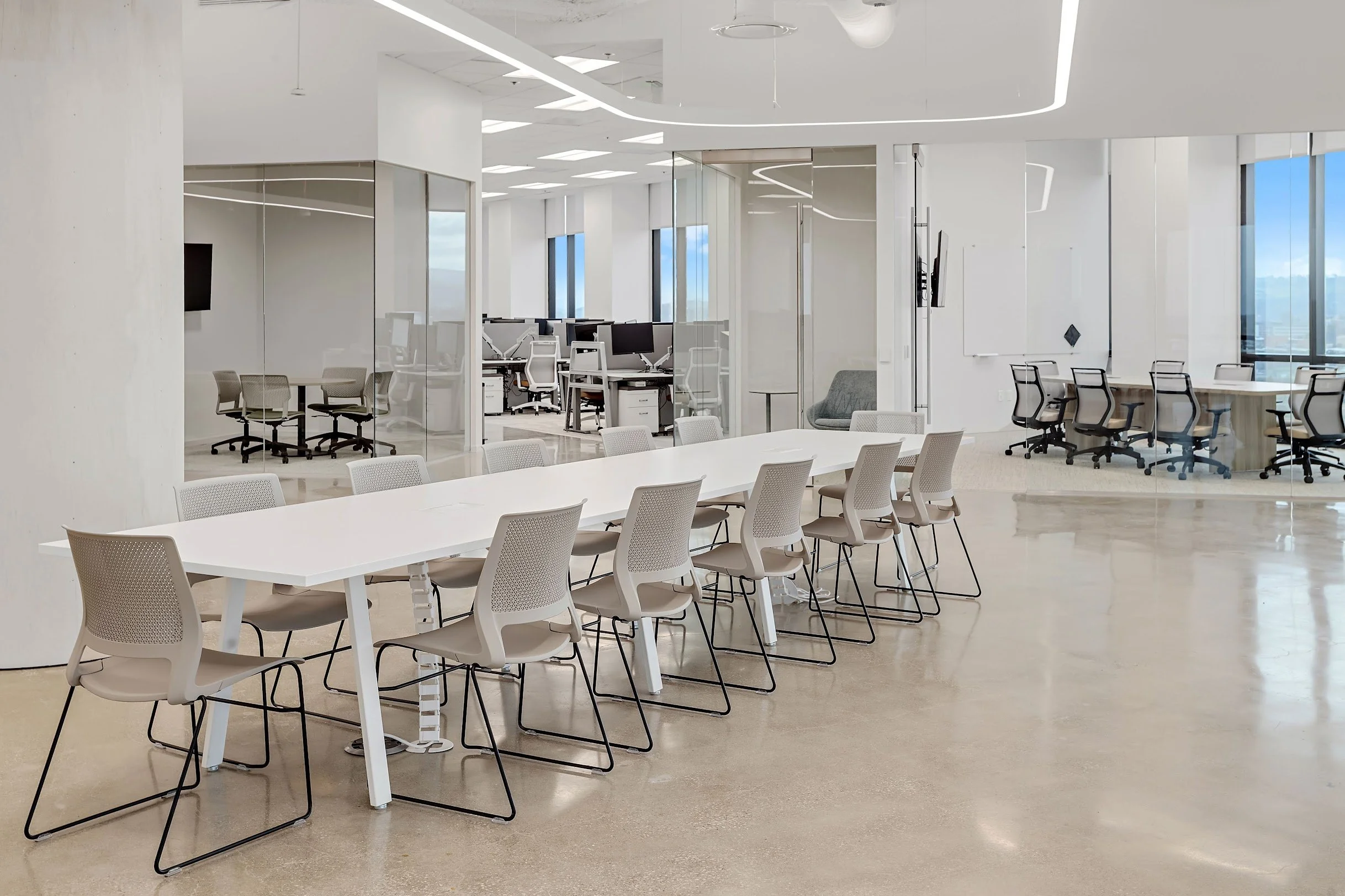 Commercial office furniture installation by Source COI featuring desks and collaborative seating