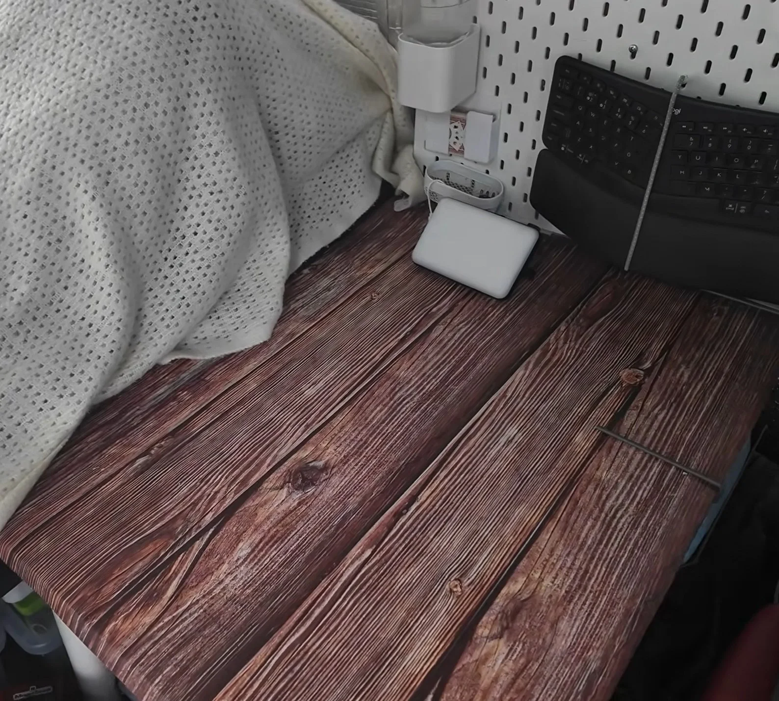 Orla's office desk setup in the van