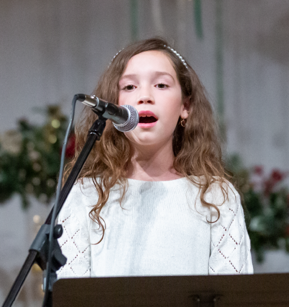Young girl singing at West Coast Music Academy in Santa Clarita