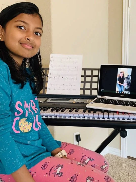 Young girl taking online live music lessons at West Coast Music Academy in Santa Clarita