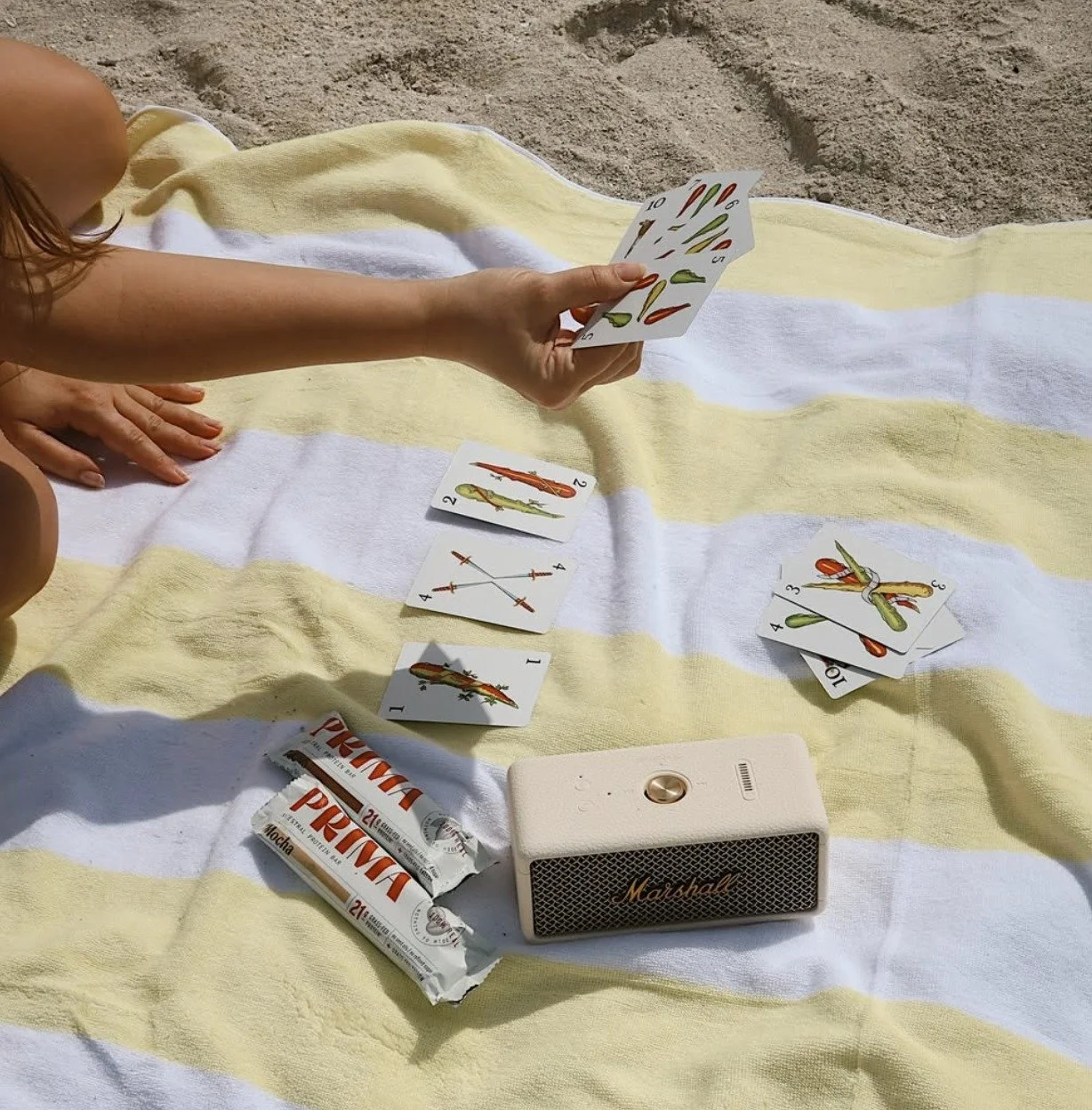 Prima bars on a striped beach towel