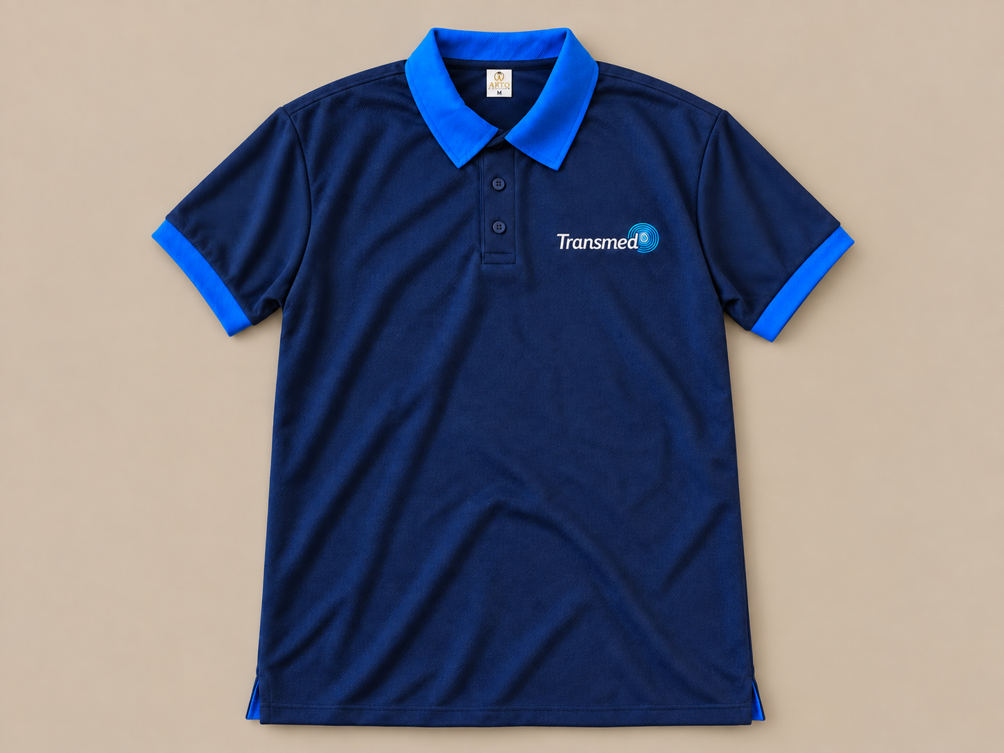 Navy Transmed polo on a warm stone background