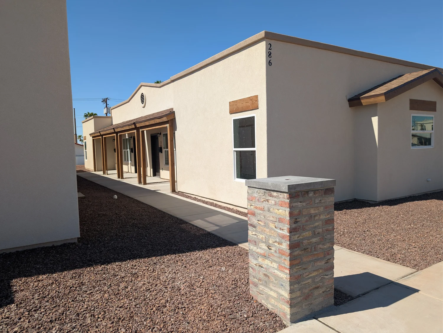 Downtown Heights building exterior with brick pillars