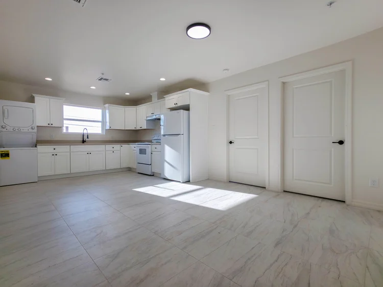 2 bedroom open living area and kitchen