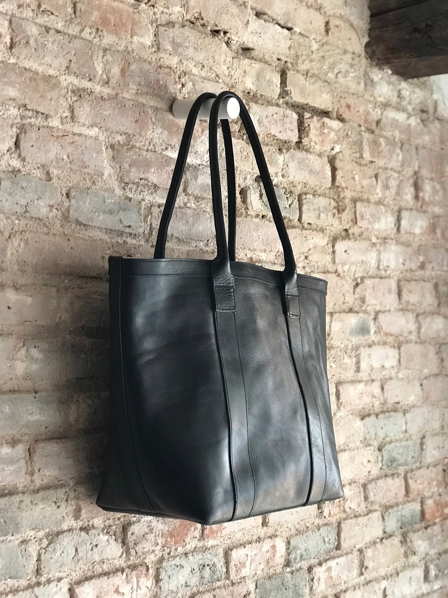 black leather flap bag
