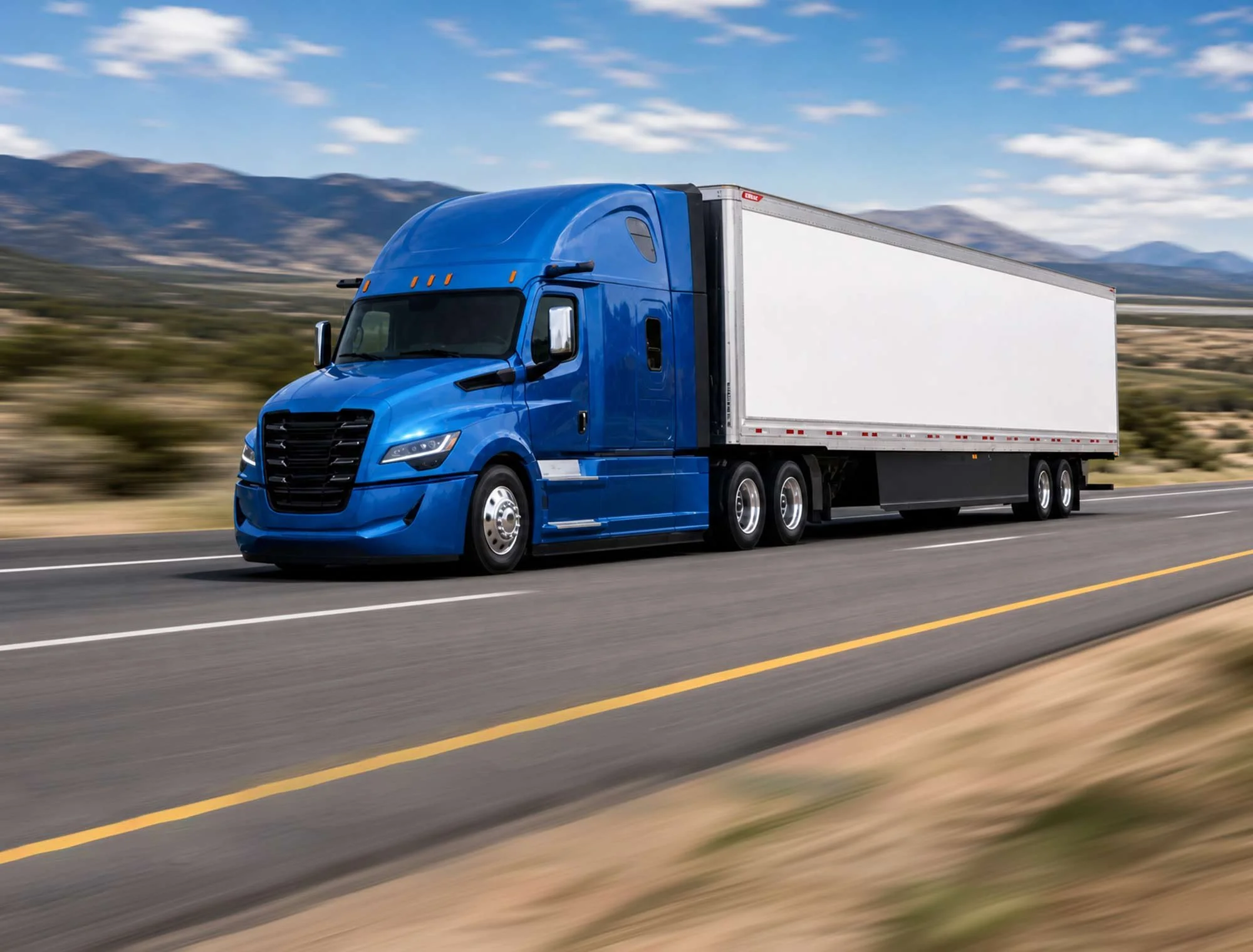 Semi truck with aerodynamic wheel covers on the highway