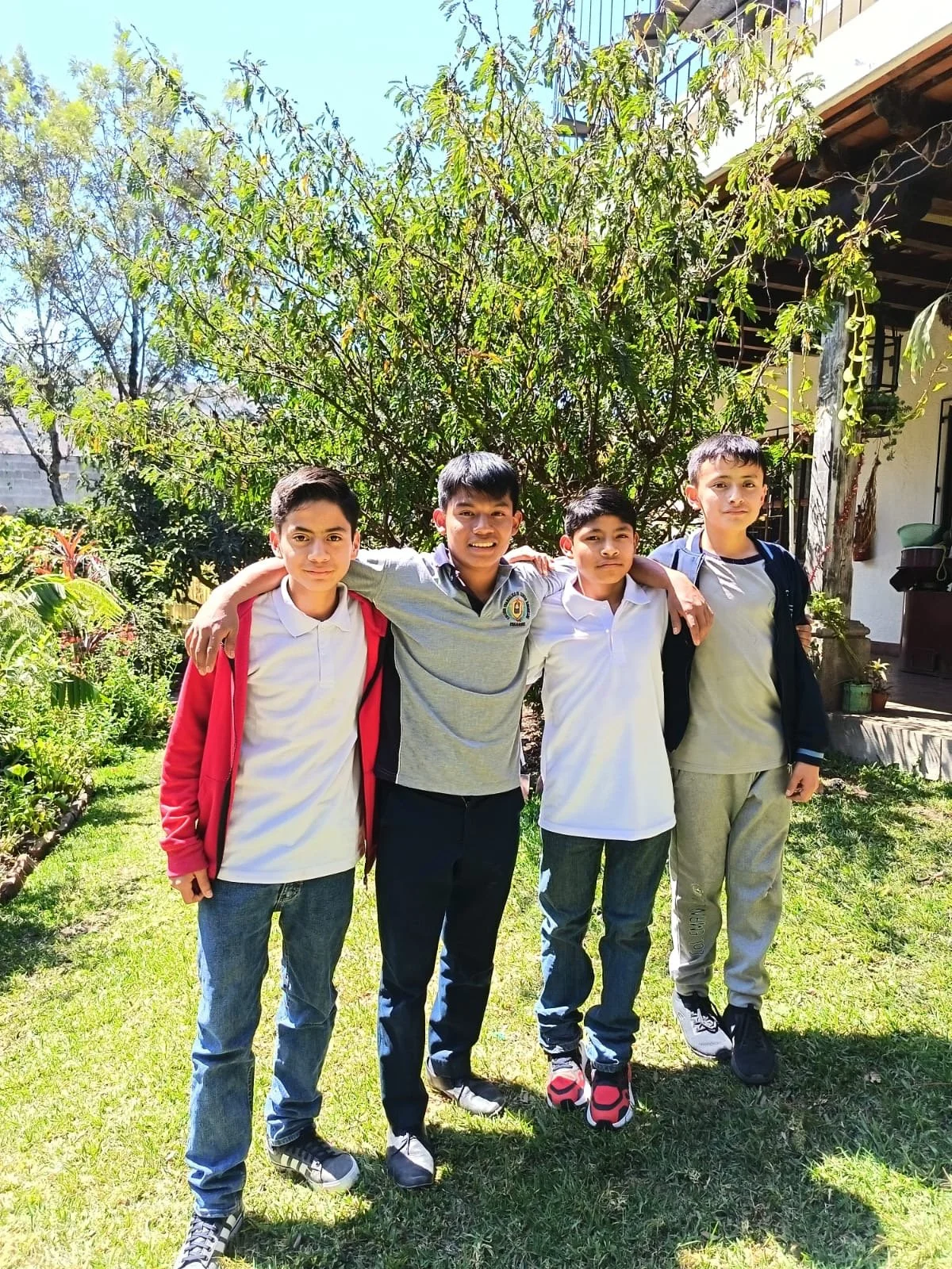 Boys from the Children's Village home standing together