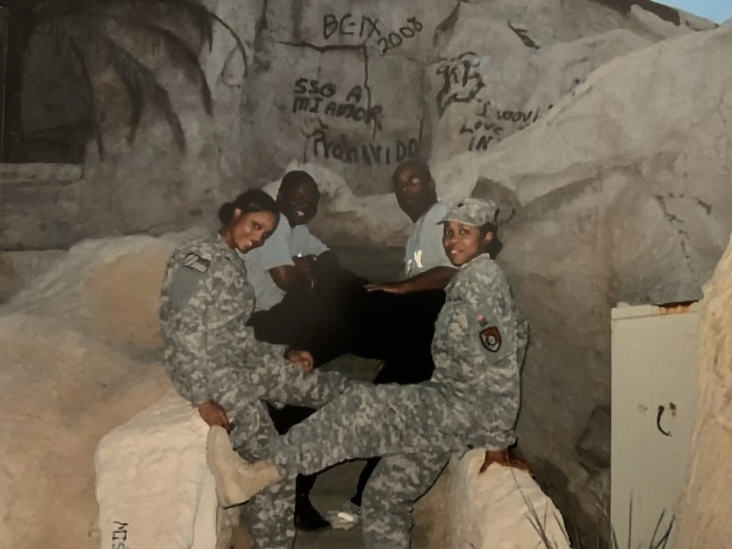 Cari in uniform with fellow soldiers during deployment, 2008