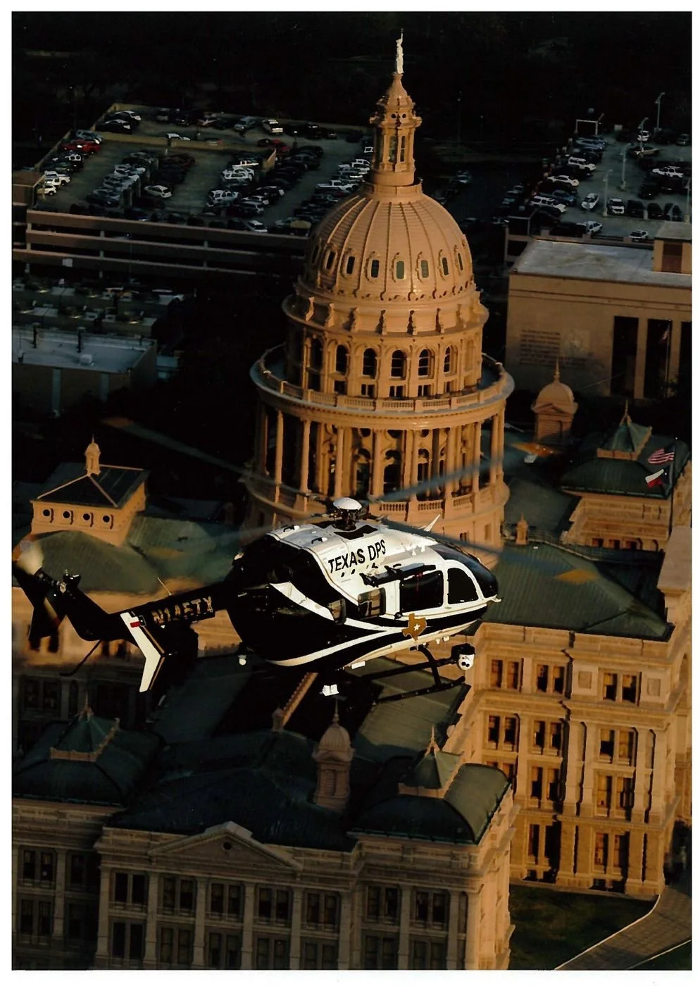 A Texas DPS helicopter over the capitol