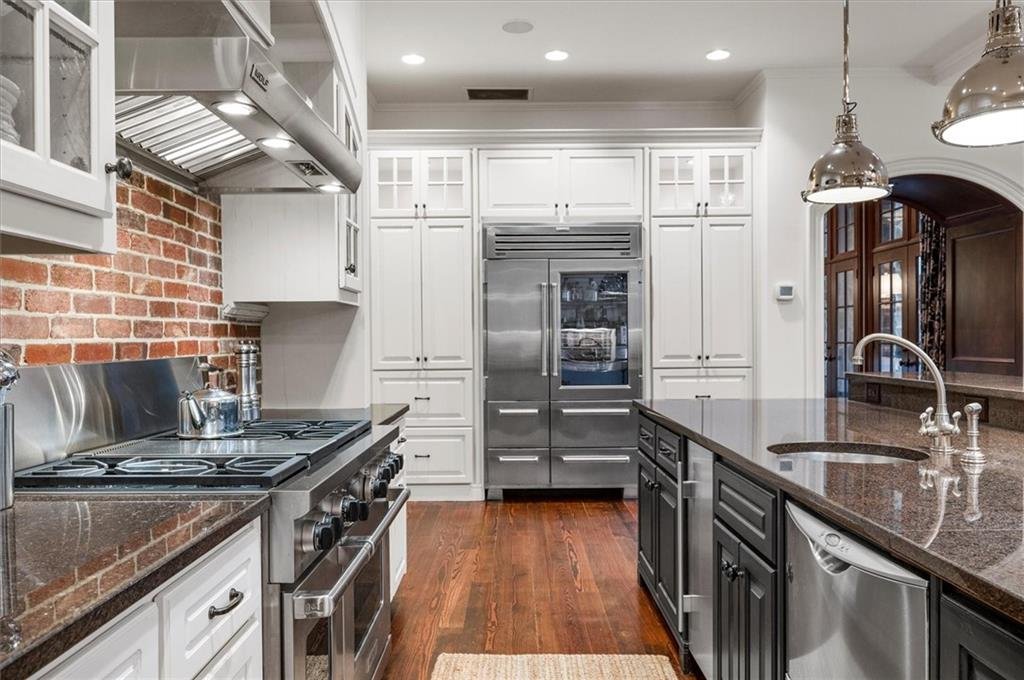Spacious kitchen at 13940 Haystack Lane with modern appliances
