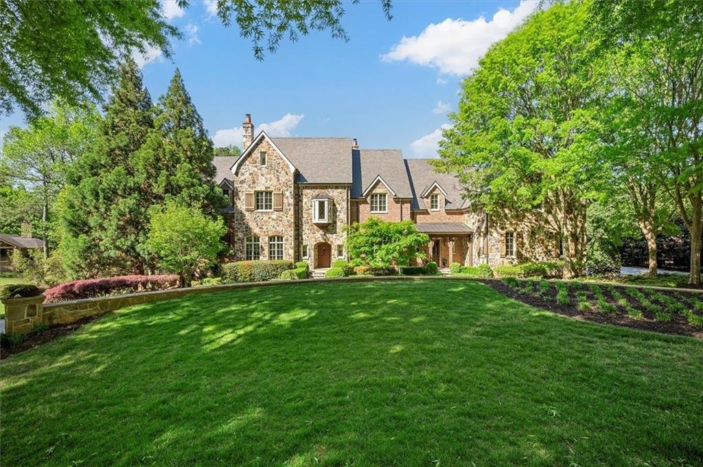 Exterior view of 13940 Haystack Lane, a luxury estate in Milton, GA
