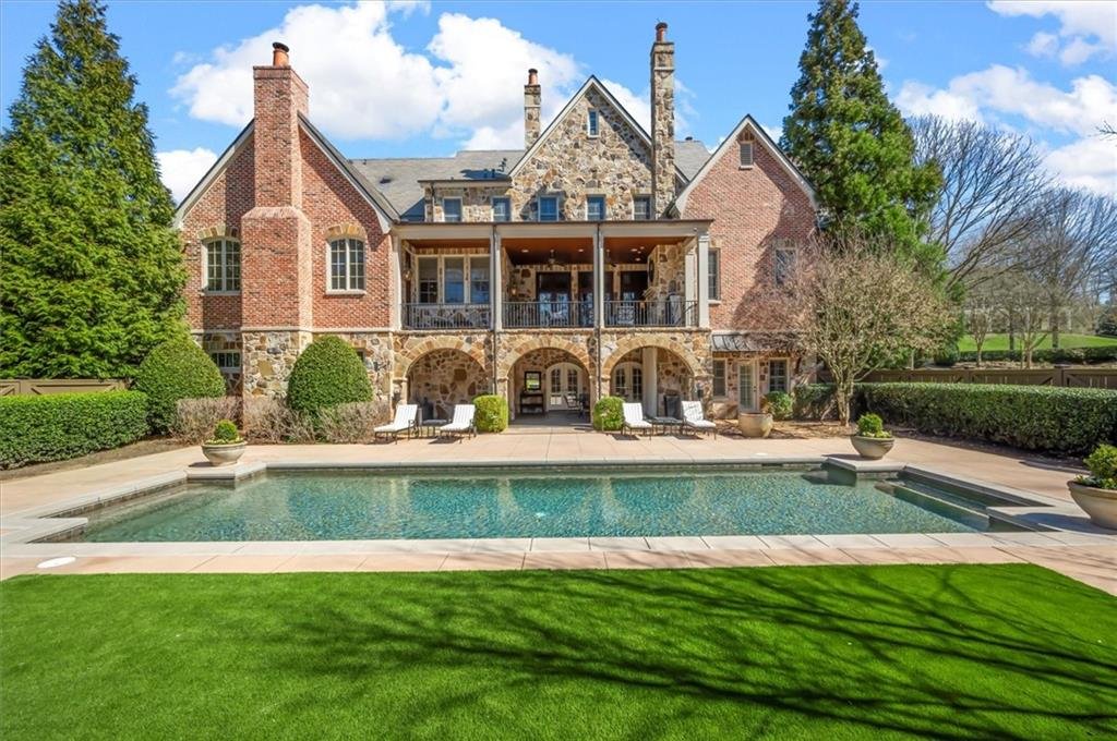 Backyard exterior view of 13940 Haystack Lane estate