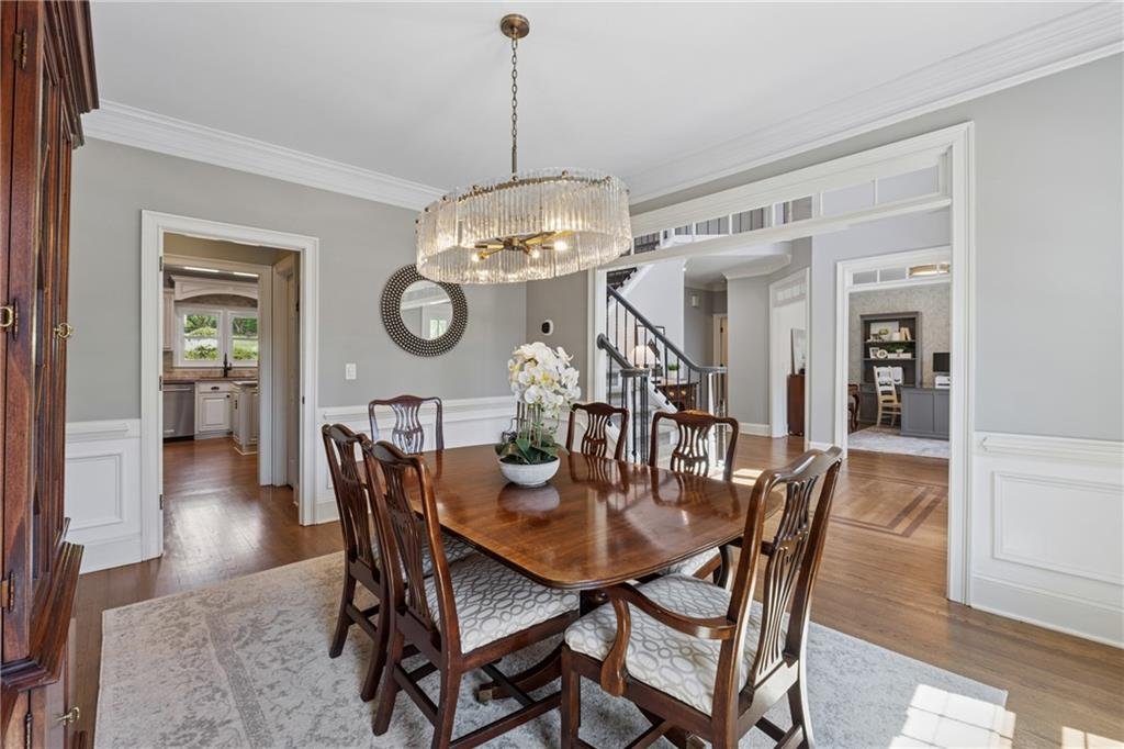 Elegant dining room with large windows at 590 Kensington Farms Drive in Milton GA