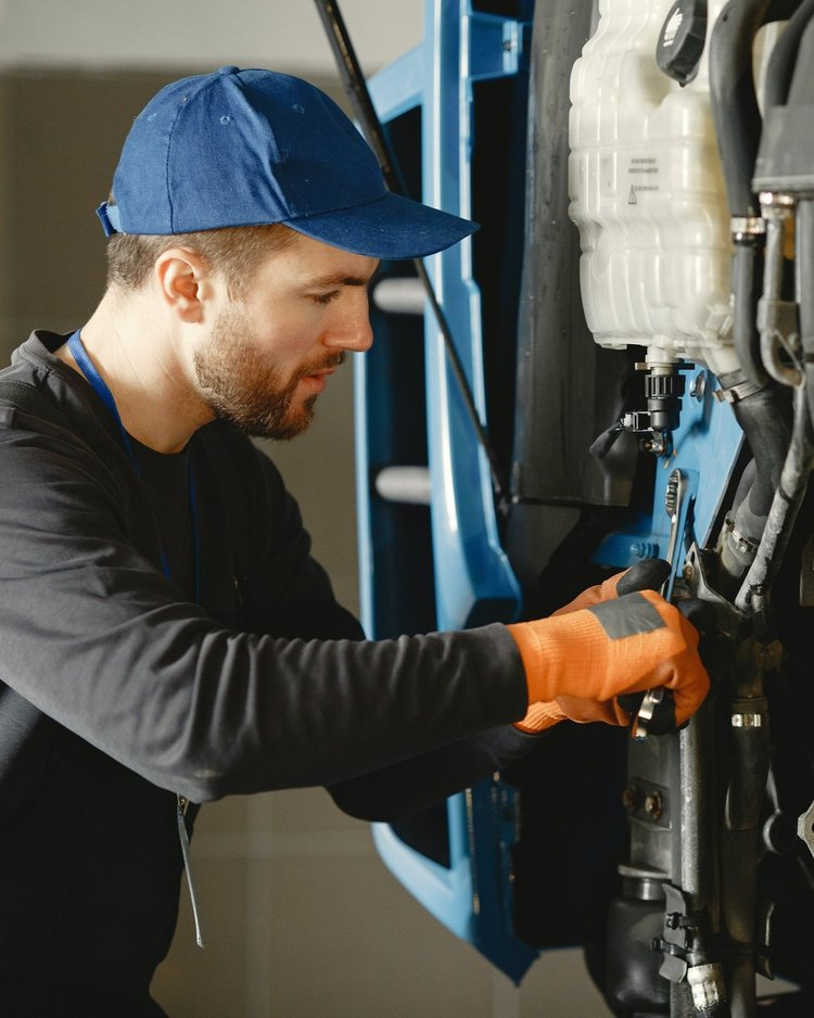 Man repairing a machine