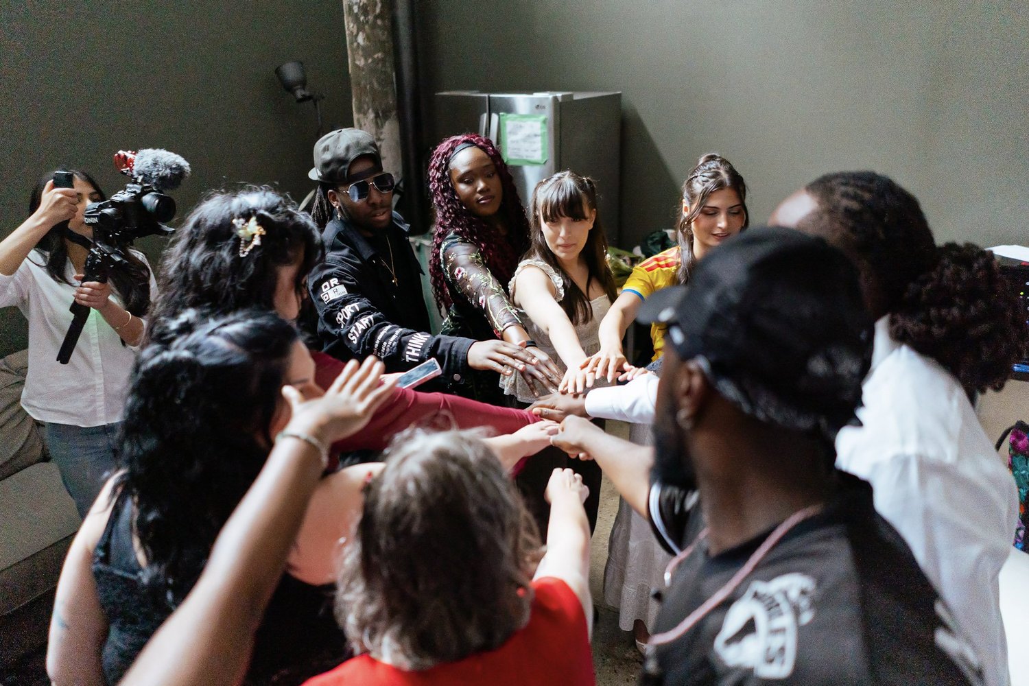 Blueprint artists joining hands before their showcase