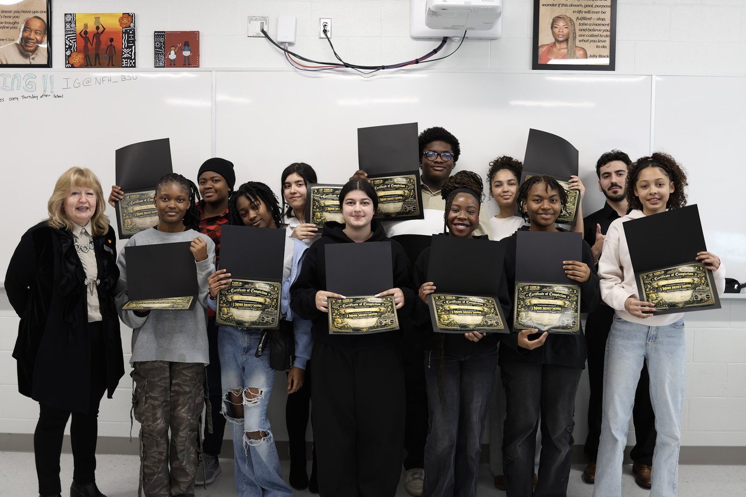I Make Money Moves participants celebrating with their completion certificates