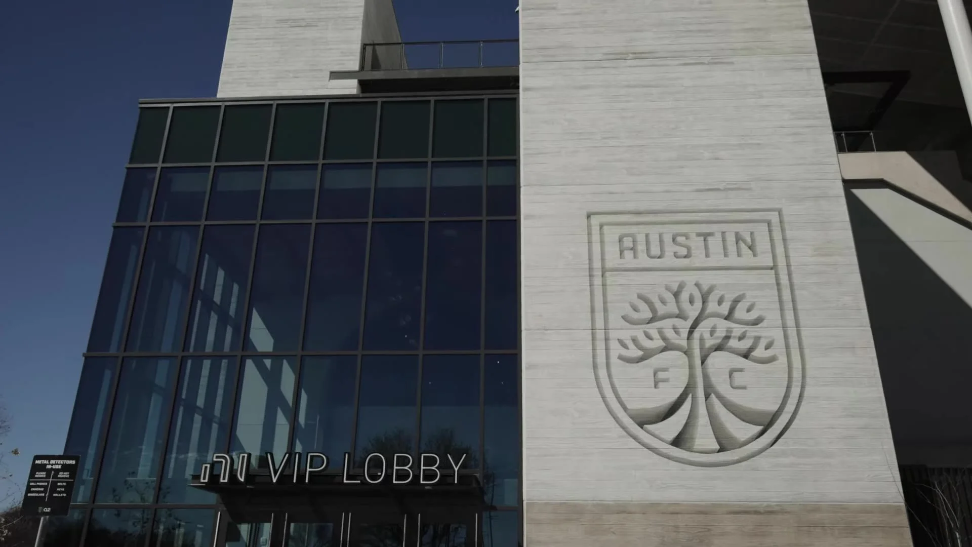 Exterior VIP Lobby entrance with Austin FC crest at Q2 Stadium in Austin, Texas