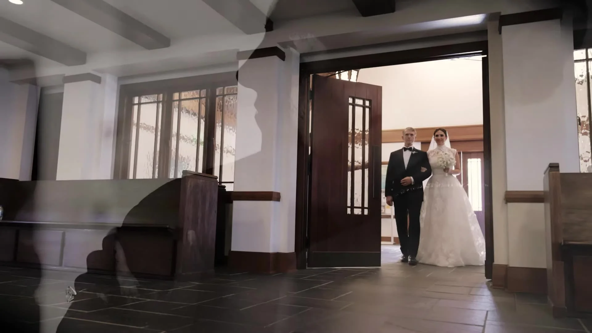 Anna in a veil walking through the church doors at Good Shepherd Episcopal Church in Austin, Texas