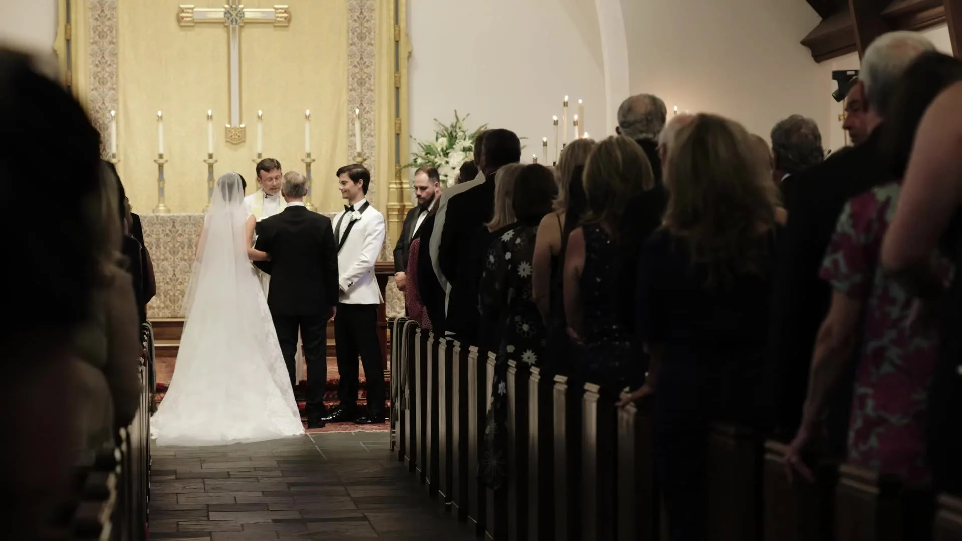 Ceremony aisle at Good Shepherd Episcopal Church in Austin, Texas, with Grant and Anna at the altar