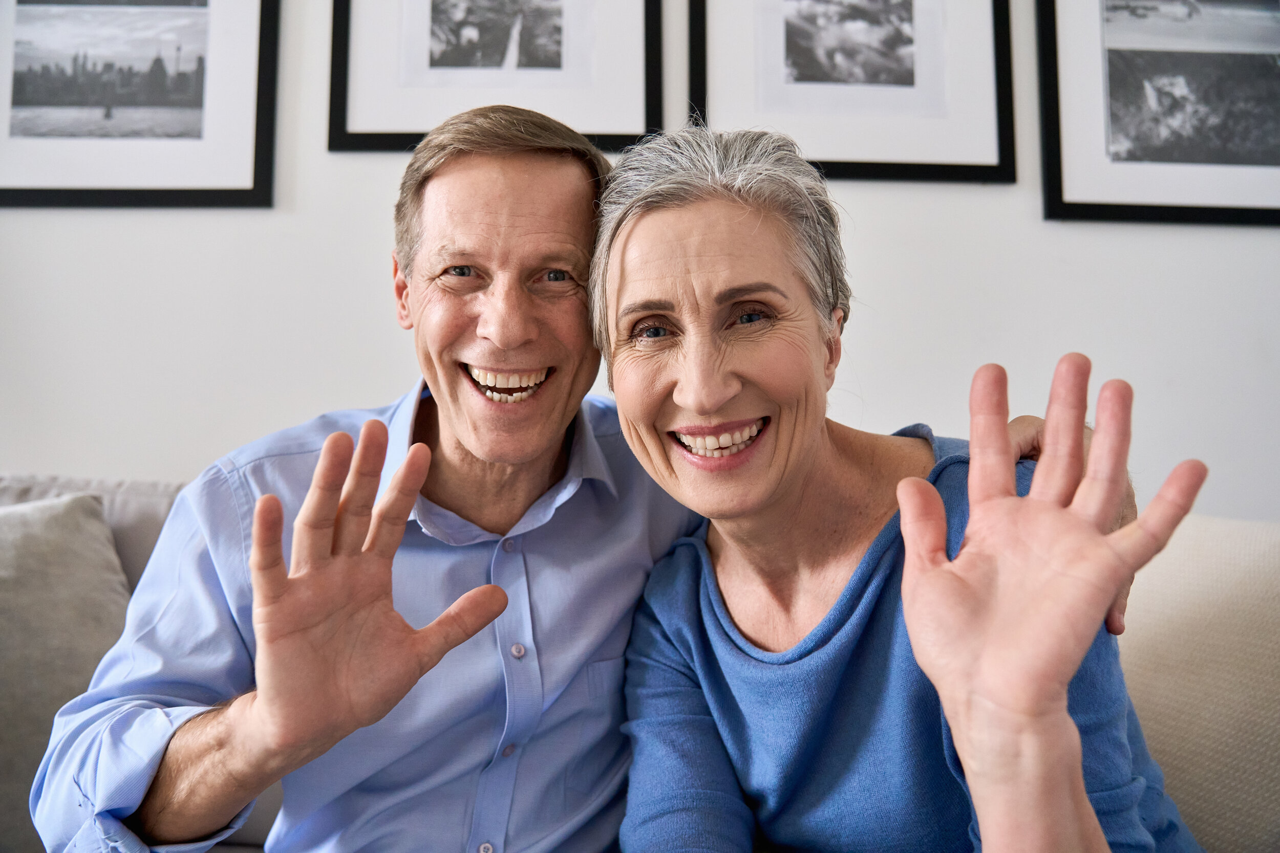 Older couple recording a warm message for their family