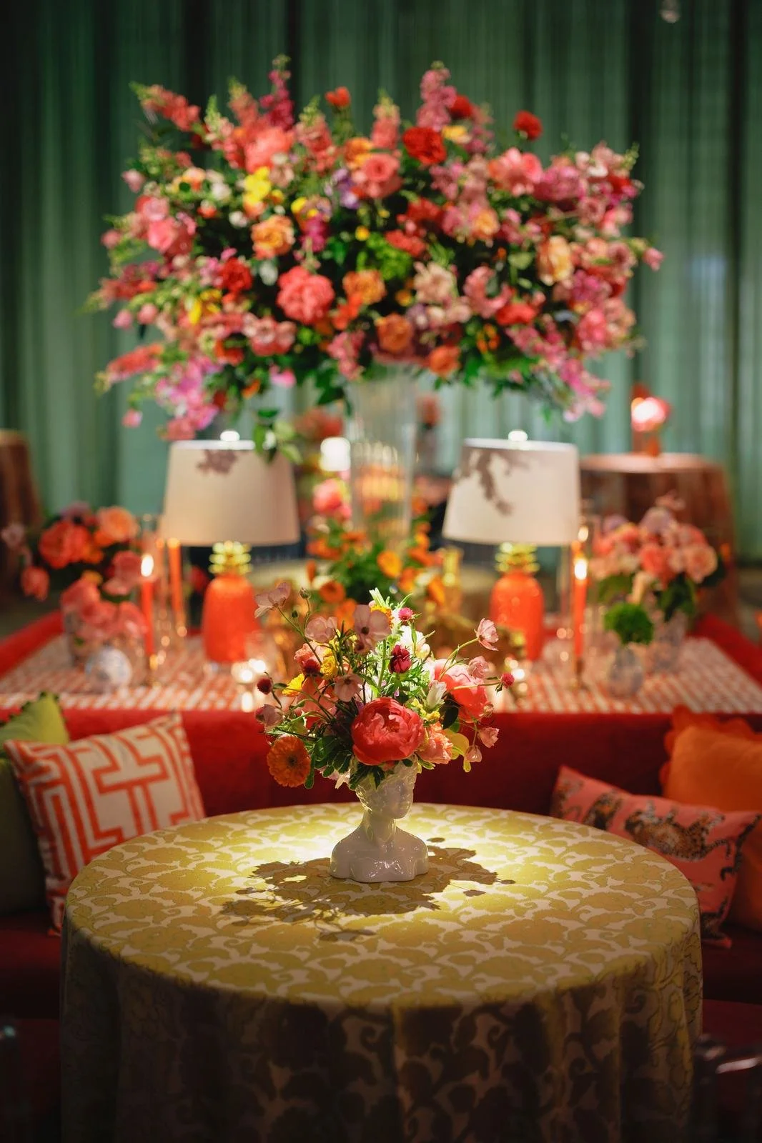 Colorful floral arrangement in a bust-shaped vase