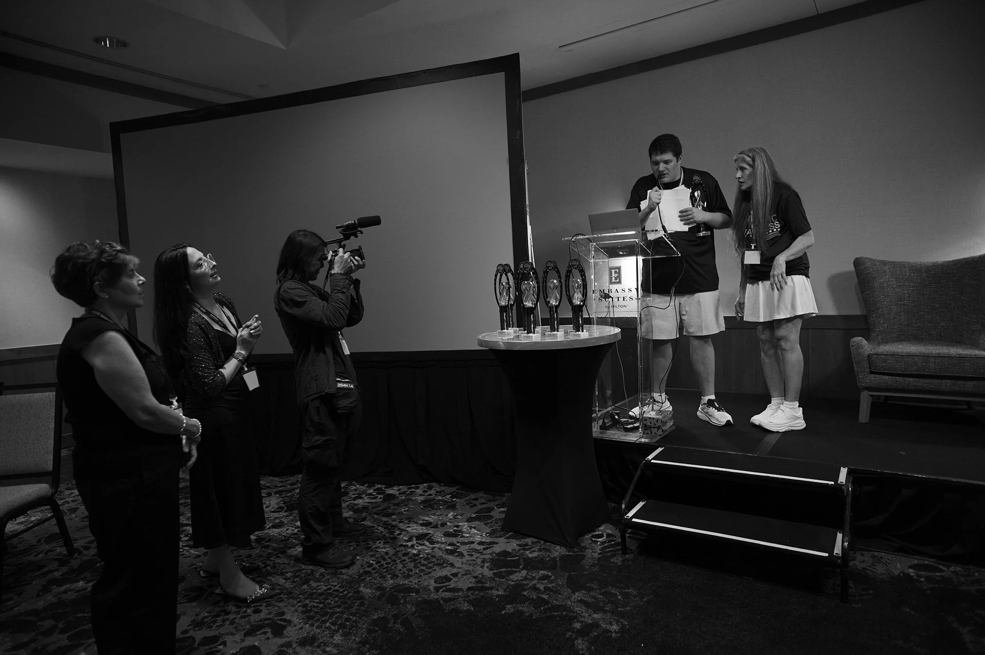 Luke gives his acceptance speech, Christine by his side.