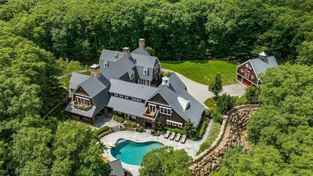 Shingle-style estate with pool