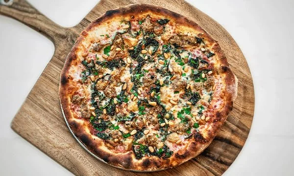 Kale and sausage pizza