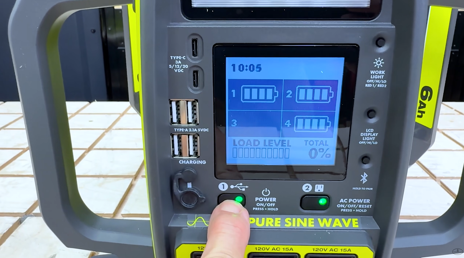 RYOBI 40V power station display showing connected battery charge levels and outlet load